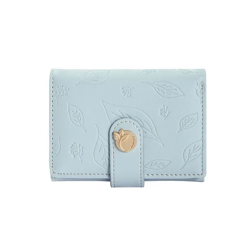 Pastel blue mini leaf card holder wallet with gold snap and stitched flap