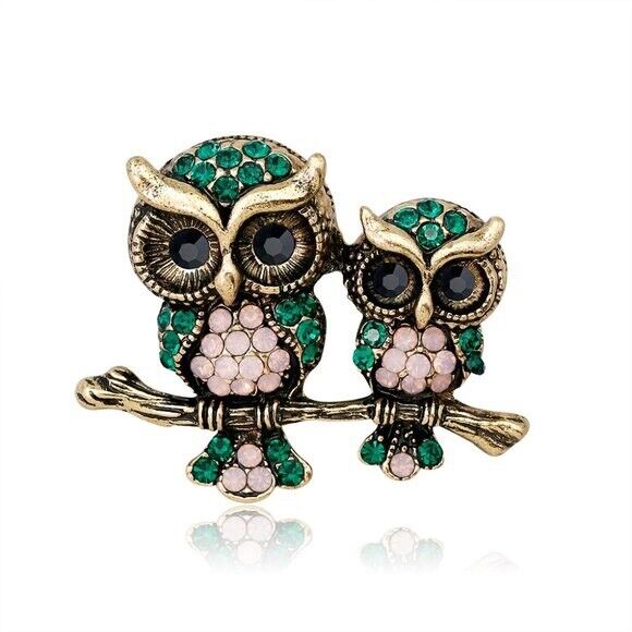 Rhinestone owl brooch with two perched owls, green and pink crystals, gold-tone finish