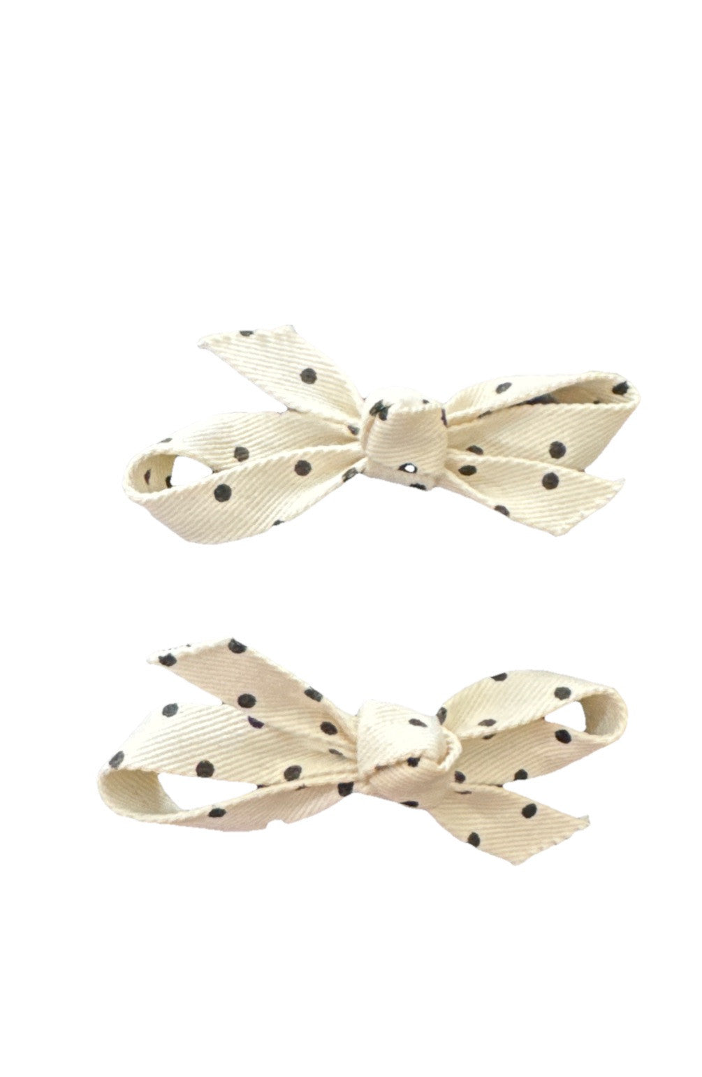 Cream fabric bow hair clips with black polka dots, two-piece set