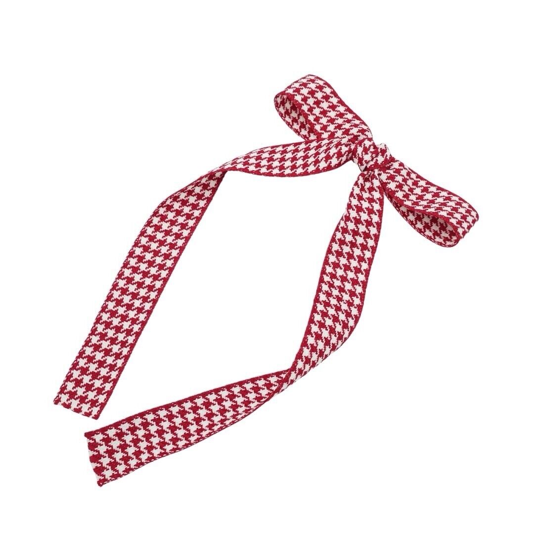 Red and white houndstooth fabric bow hair barrette with long ribbon tails
