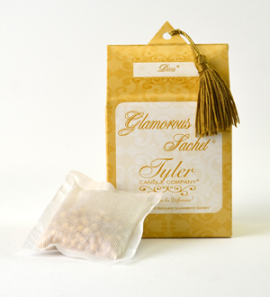 Scented dryer sachet pouch with filling and decorative yellow tag