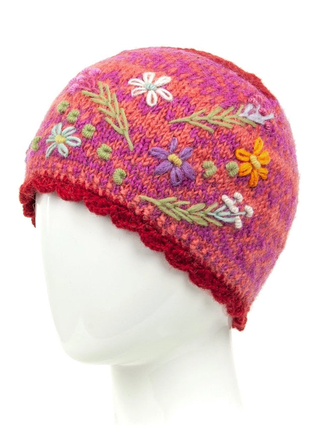 Purple wool knit beanie with colorful flower embroidery and deep red ribbed cuff