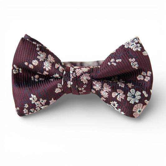 Boys bow tie in burgundy fabric with white and light floral pattern