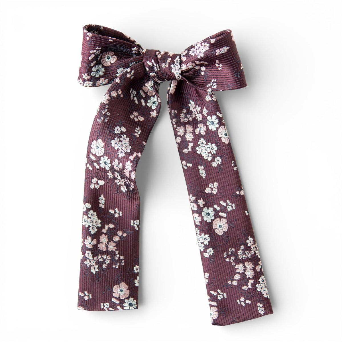 Burgundy floral lady hair bow with tied ribbon tails