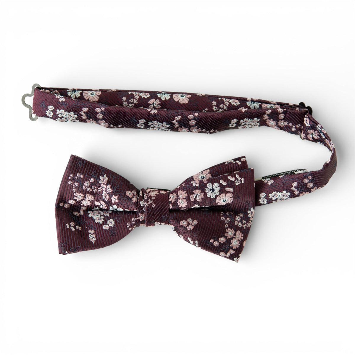 Men's pre-tied bow tie with dark maroon floral pattern and textured stripes