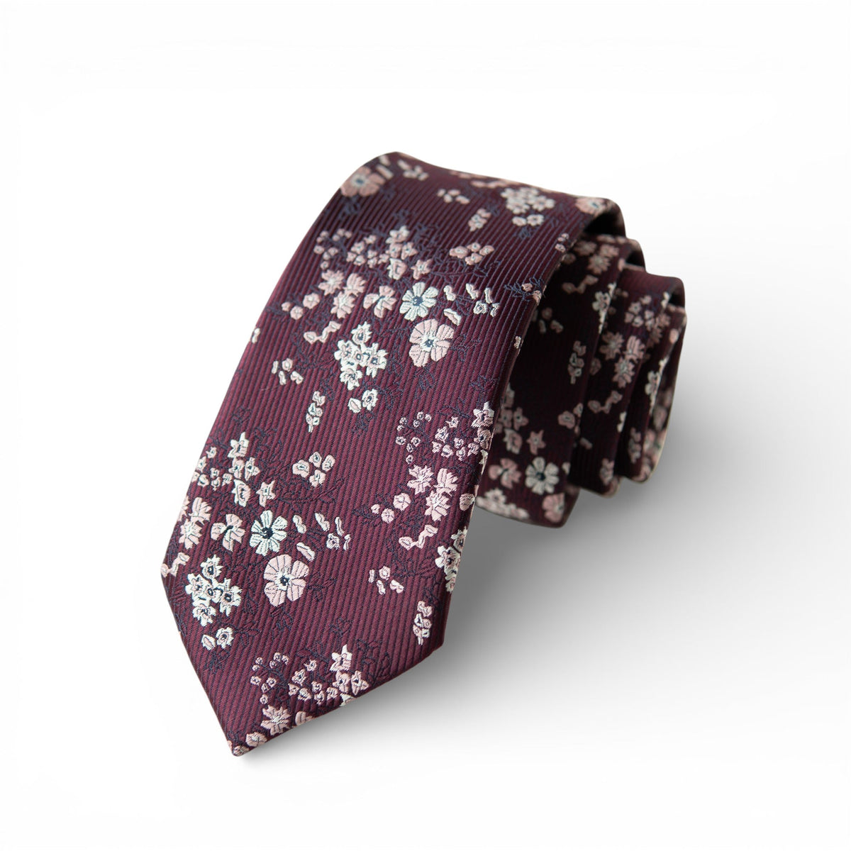 Men's floral tie with burgundy base, small white blossoms and light pink accents