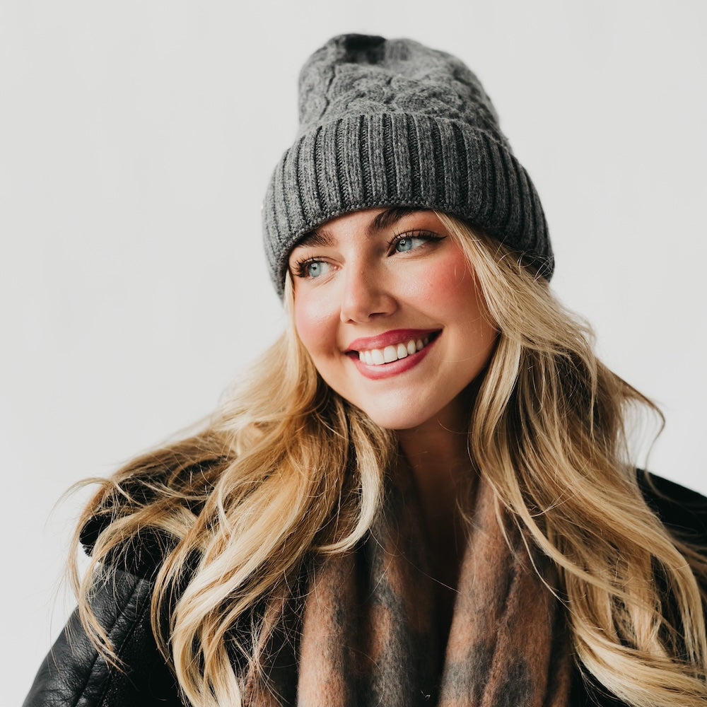 Charcoal cashmere beanie with satin-lined cuff and cable knit crown