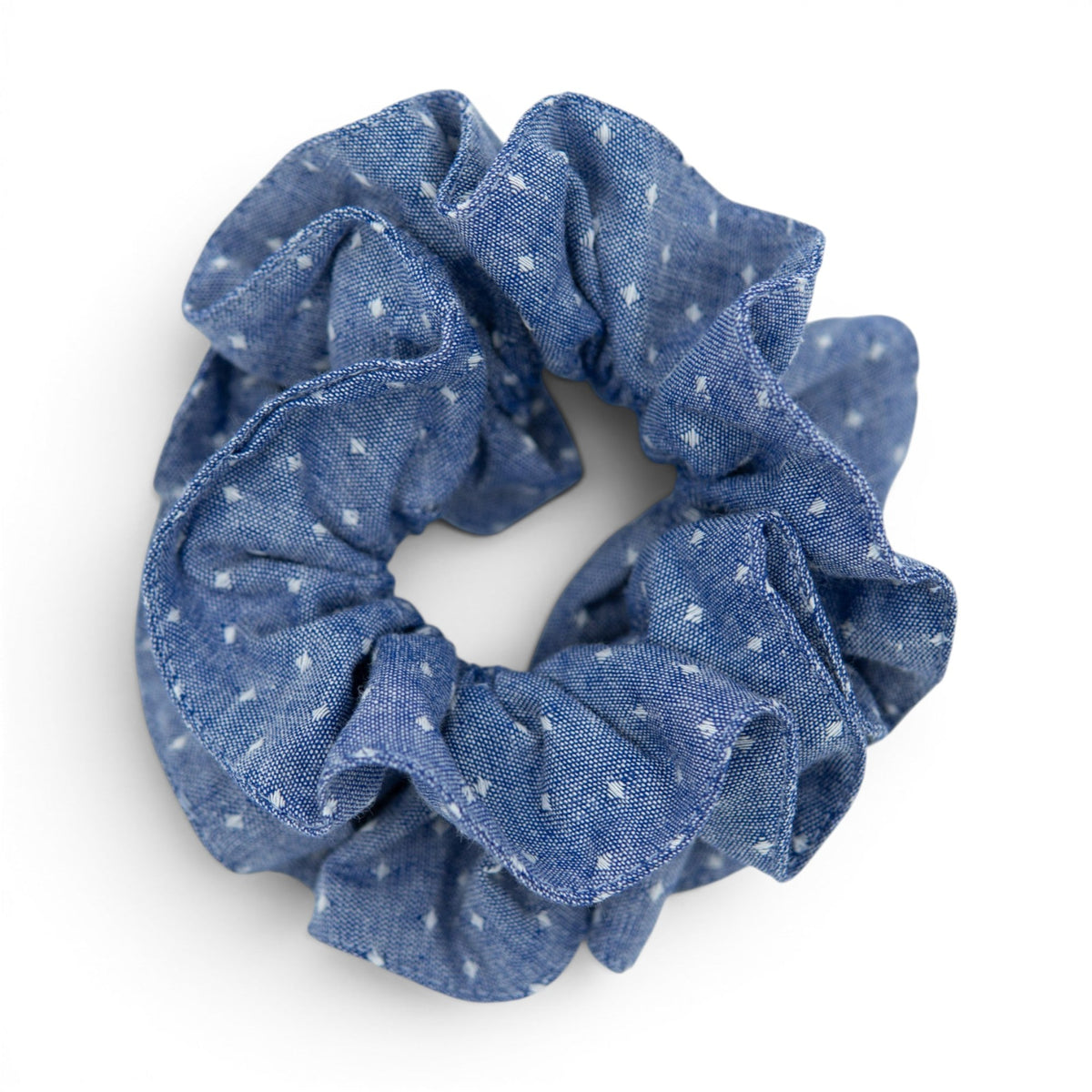 Blue fabric hair scrunchie with small light pattern