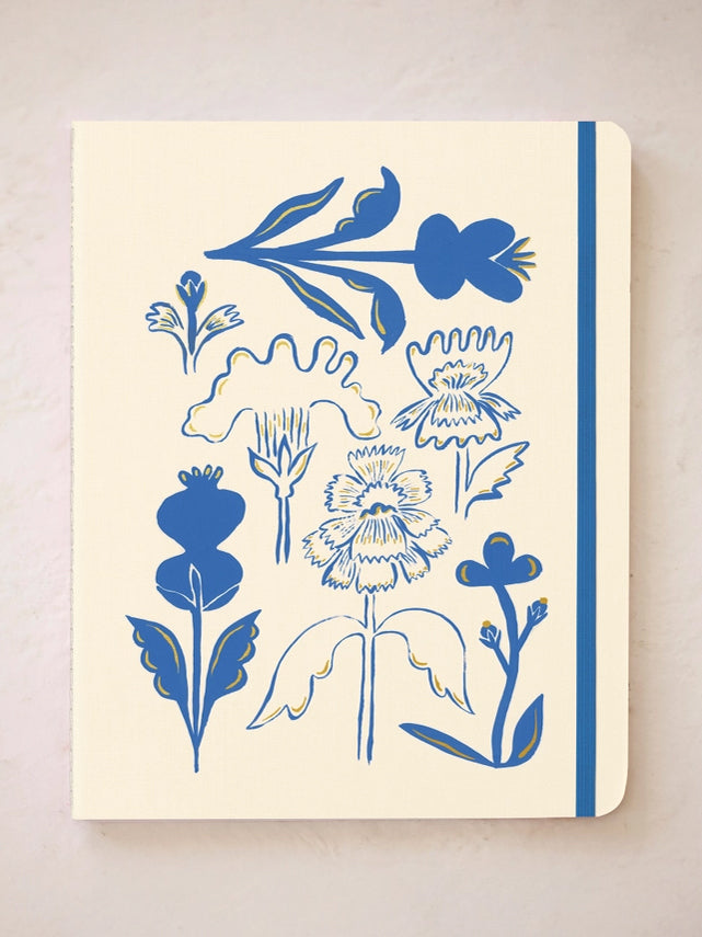 Cream and blue floral notebook cover with bold bouquet and leaves illustration
