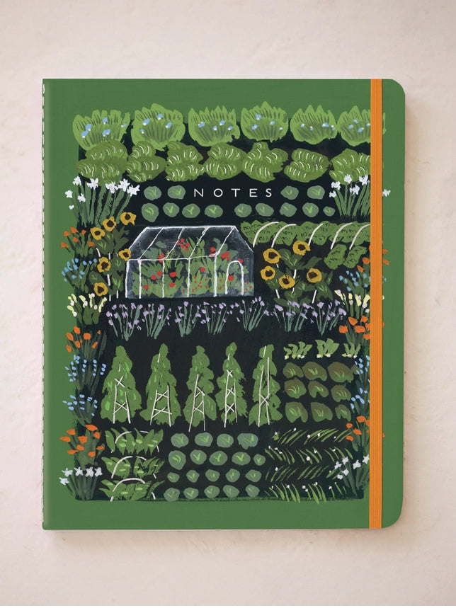 Green garden NOTES notebook with illustrated greenhouse and plants on cover.