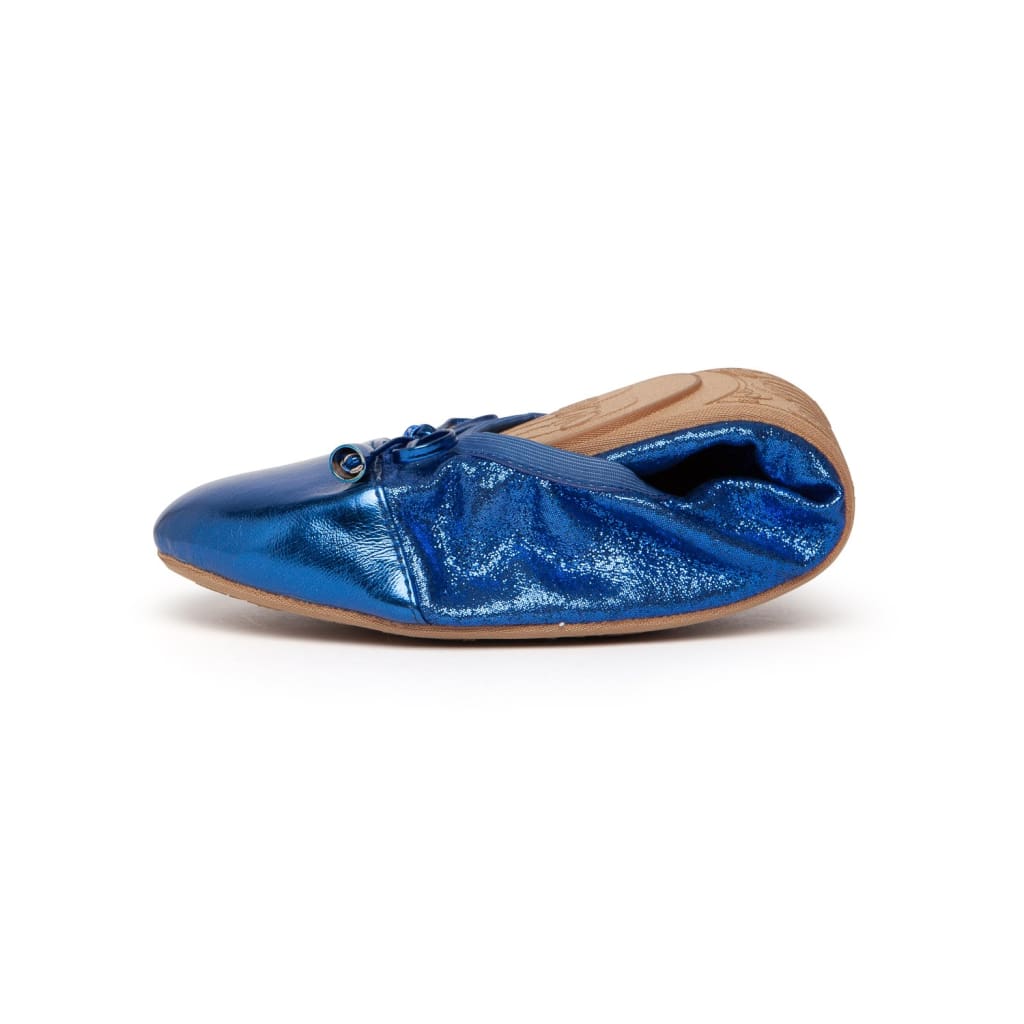 Cobalt blue metallic flats, heel-side view with lace-up bow