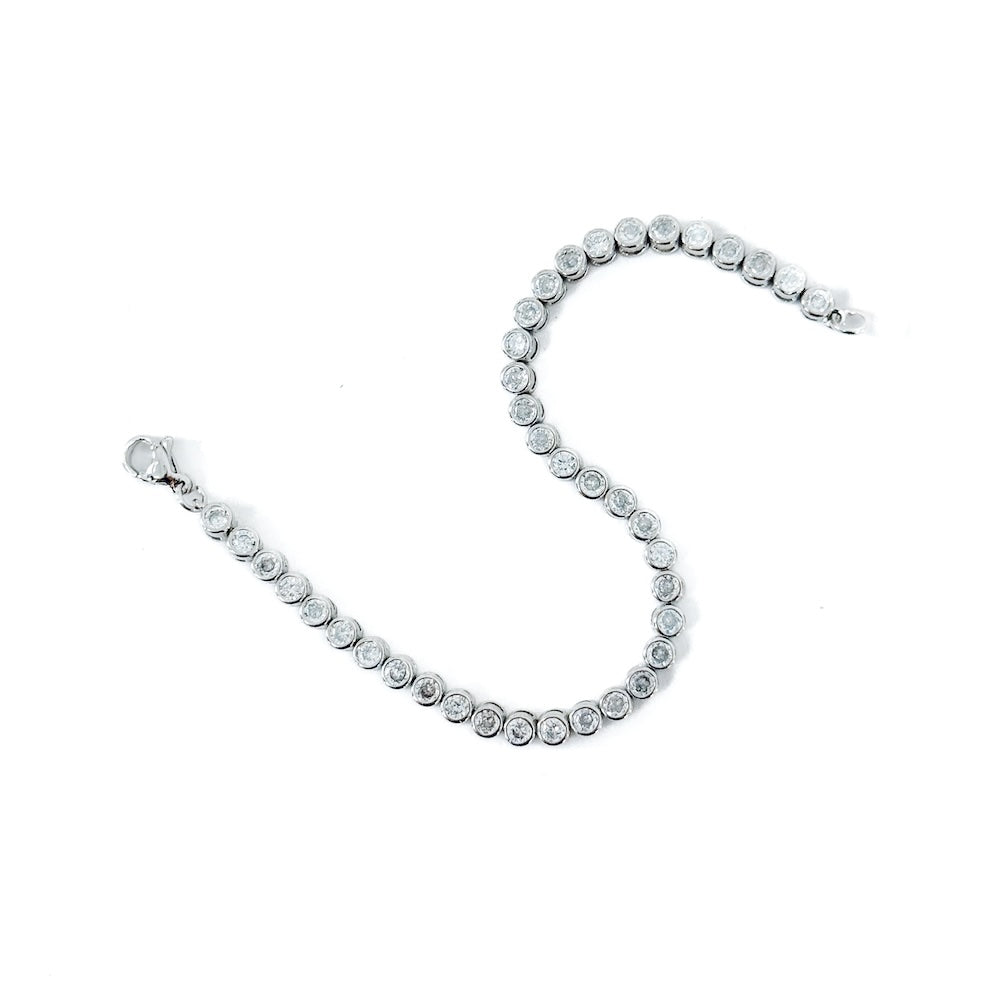 Silver tennis bracelet with round diamond-look stones
