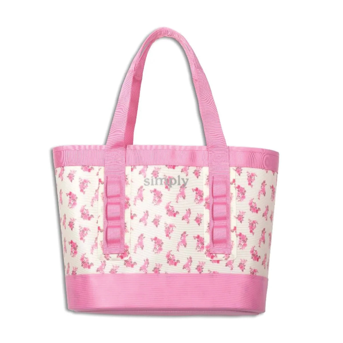 Pink floral tote bag with wide handles and front pocket; 'Simply' graphic panel