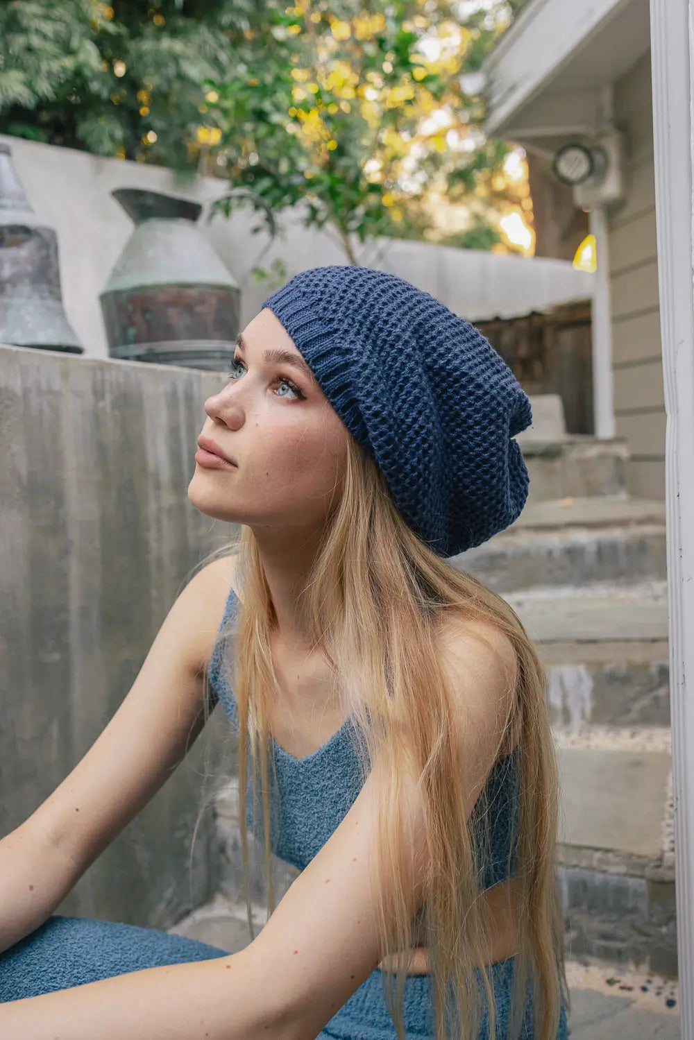 Blue slouch waffle knit beanie with textured ribbed foldover cuff