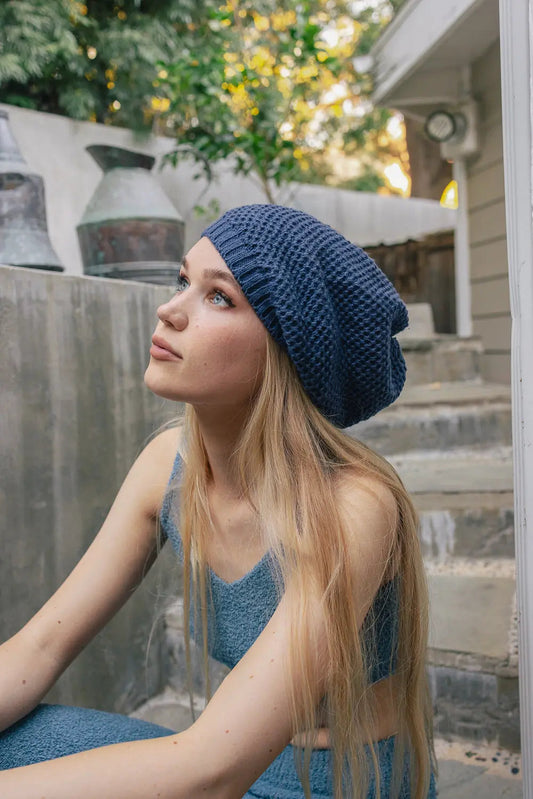 Blue slouch waffle knit beanie with textured ribbed foldover cuff