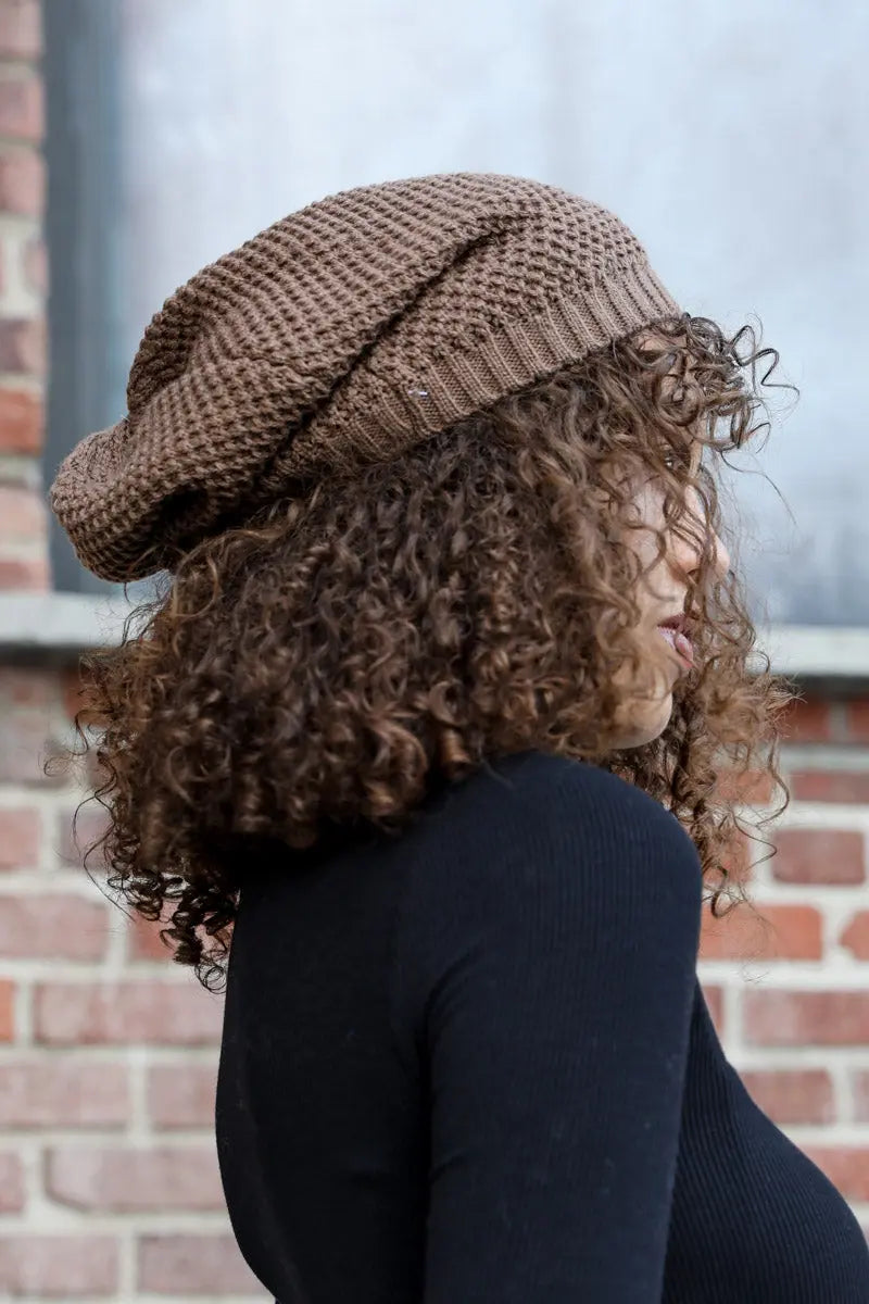 Mocha slouch waffle knit beanie viewed from side, ribbed cuff and waffle texture