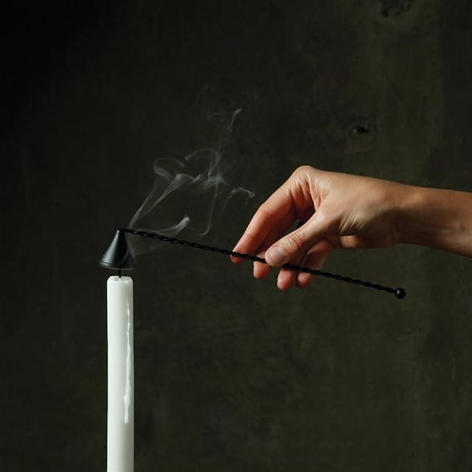 Metal snuffer with black braided cord and cone tip for extinguishing candles
