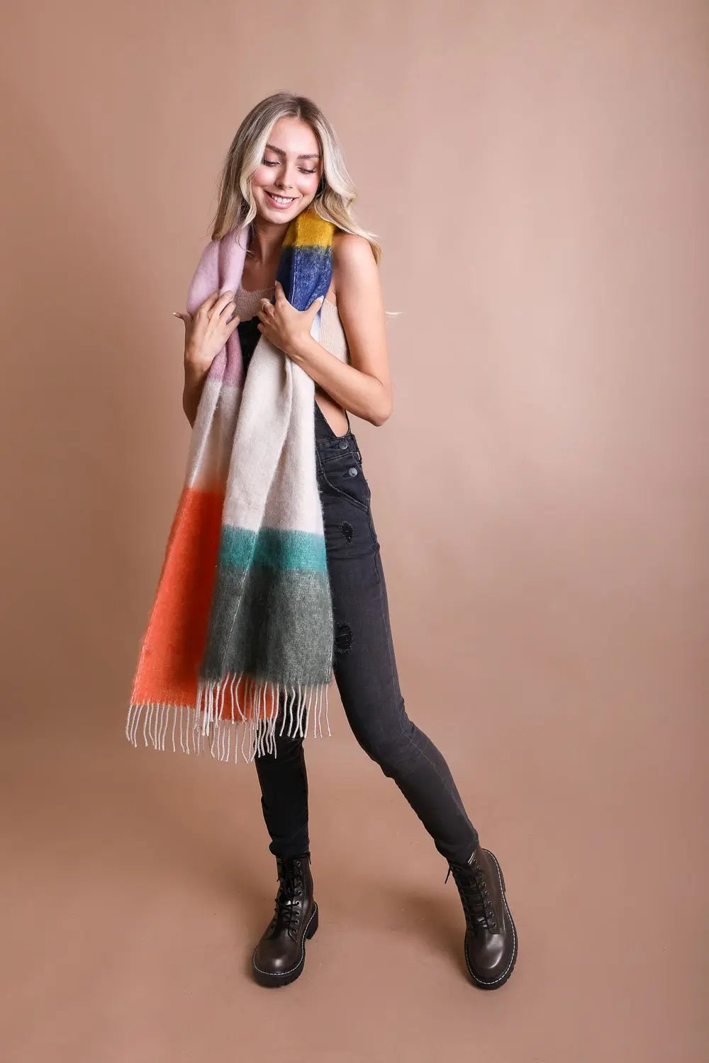 Multicolor striped mohair scarf with blue, orange, and green panels; fringe hem.