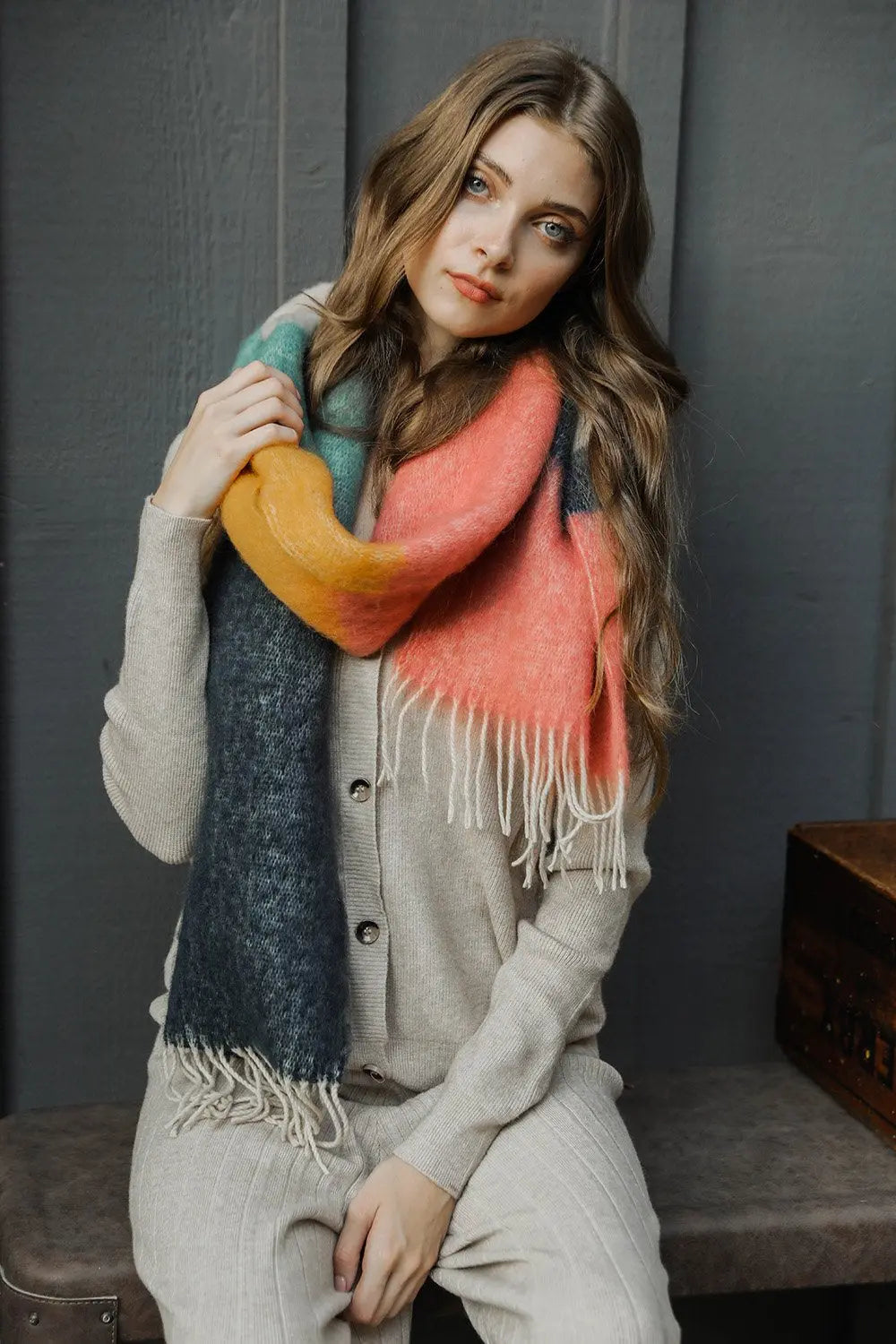 Colorblock mohair scarf with coral and dark gray stripes, long fringe.