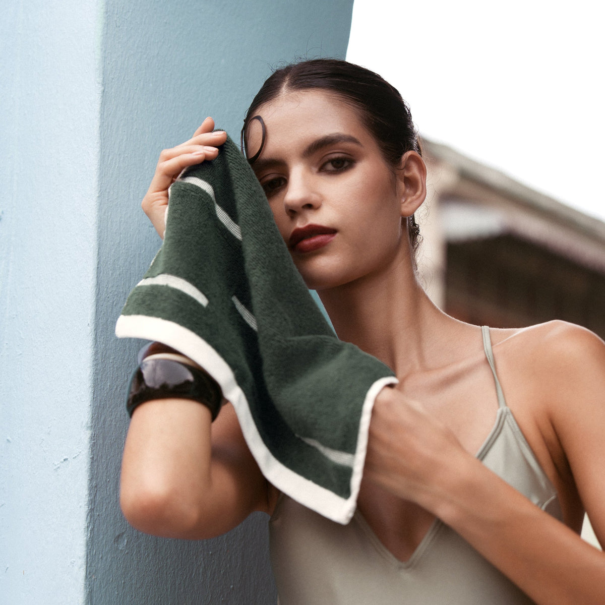 Australian cotton hand towel, dark green with cream and white stripe accents