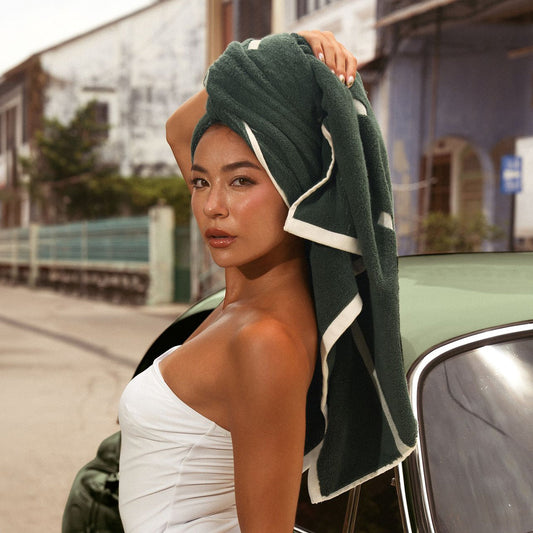 Sorrel Australian cotton towel in dark green with ecru striped border