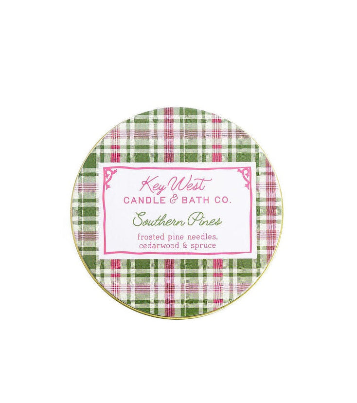 Round tin lid with green plaid pattern and pink Key West Candle & Bath Co label