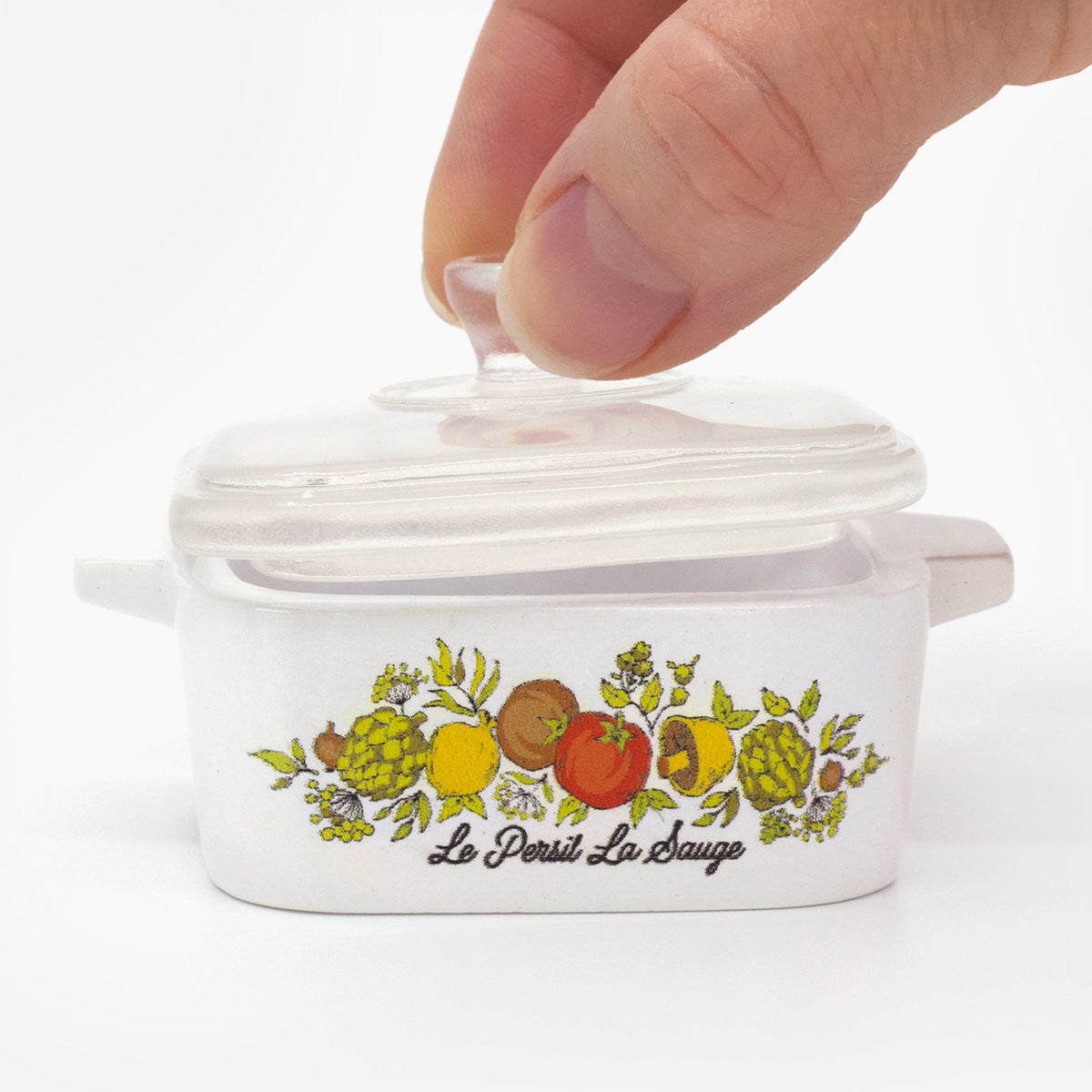 Mini trinket box with clear lid, white ceramic body, fruit and herb illustration on front