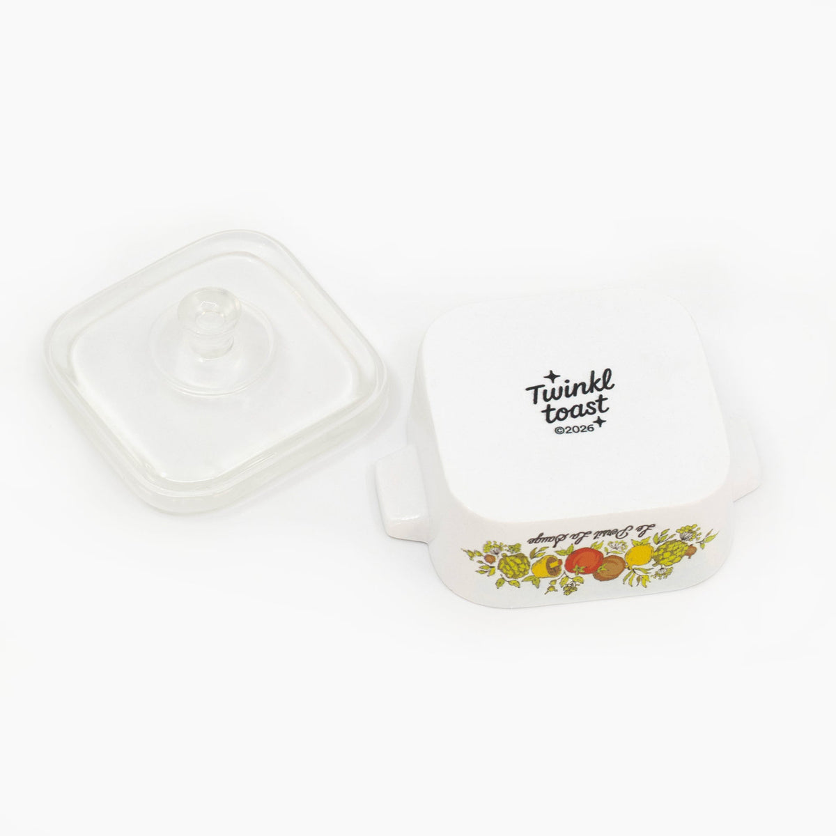 Mini trinket box with clear lid; Twinkle Toast text on lid and fruit-herb print on base