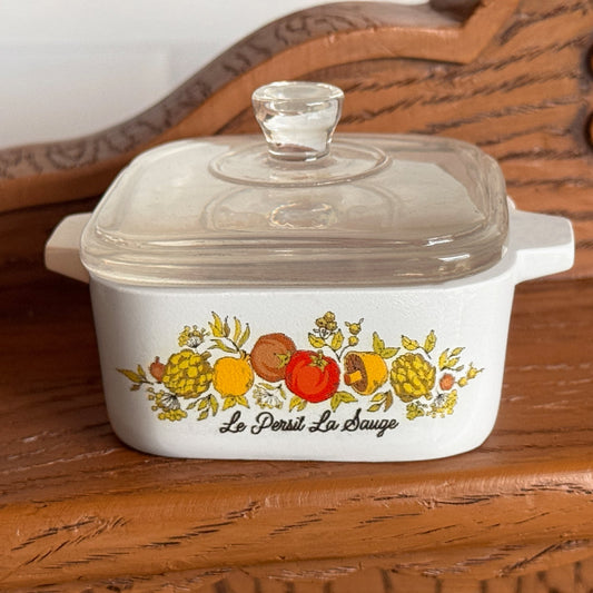 Mini trinket box with clear glass lid and side handles, white ceramic with fruit-herb print