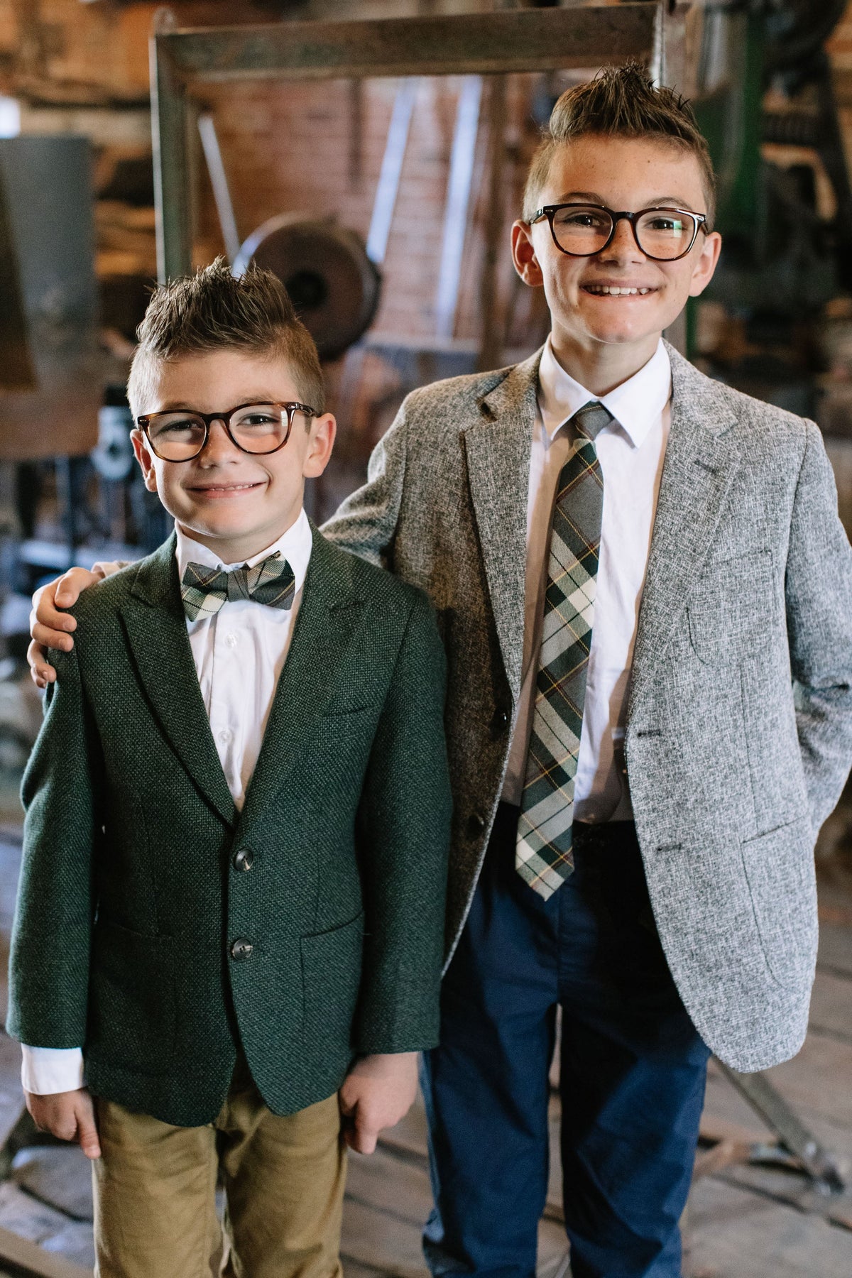 Boys plaid neckties with gray, cream, and dark green check pattern