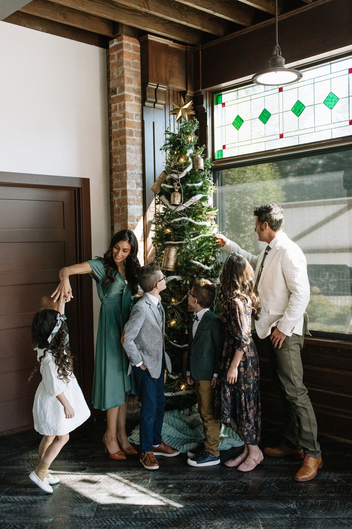 Plaid hair bows on children standing together