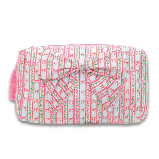 Quilted cosmo bag with striped pink and green fabric and bow detail