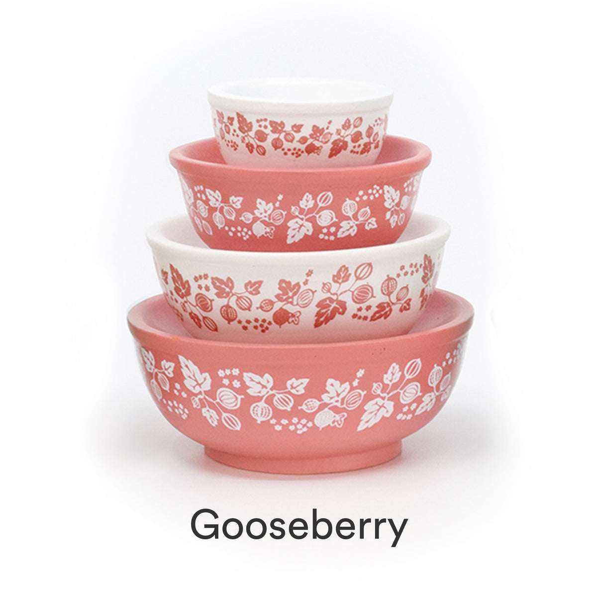 Mini stackable mixing bowl set with blush pink floral pattern on white and pink bowls.