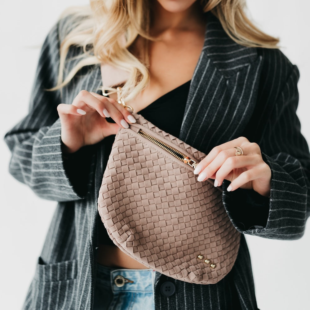 Taupe woven suede bum bag with top zipper and gold-tone hardware, small studs