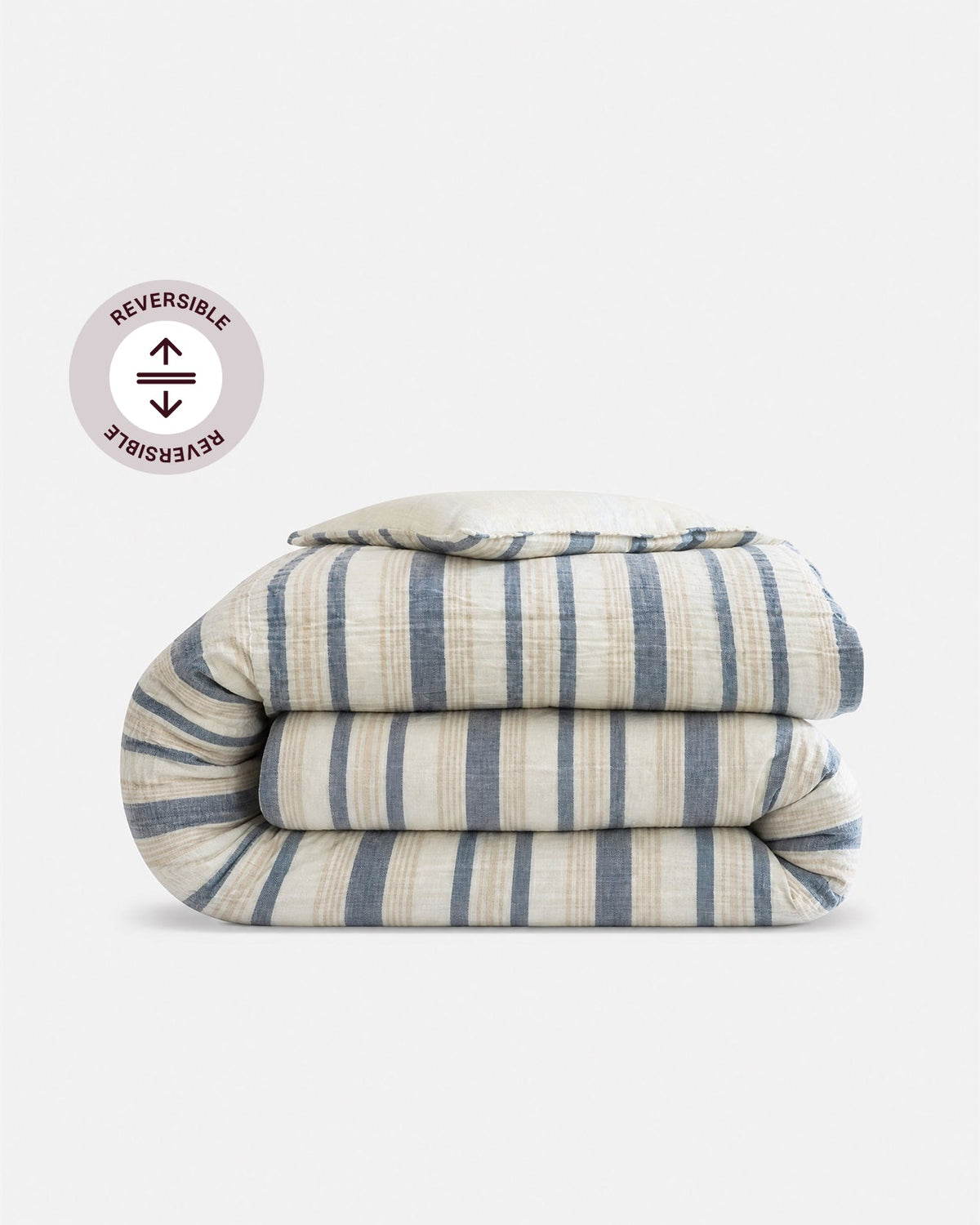 Reversible cotton duvet cover, white base with blue and navy vertical stripe pattern