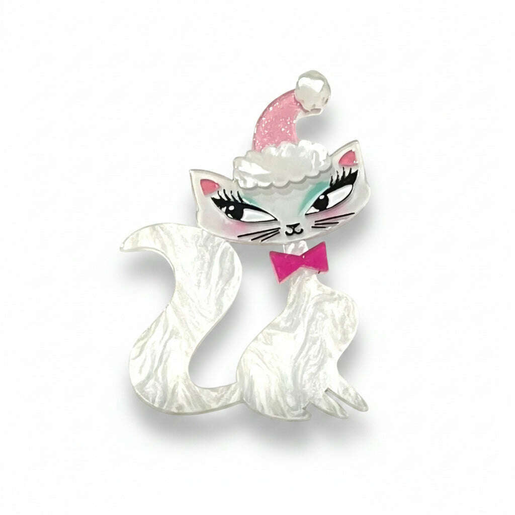 White cat enamel brooch with pink cap, cloud trim, and pink bow