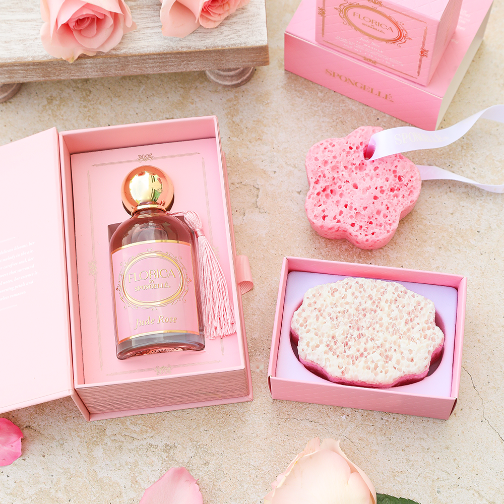 Jude Rose gift set with fragrance bottle and pink heart sponge in open boxes