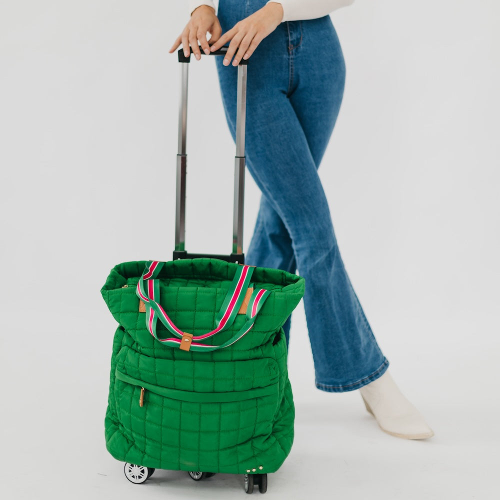 Quilted emerald tote roller bag with striped trim and telescoping handle, rolling wheels