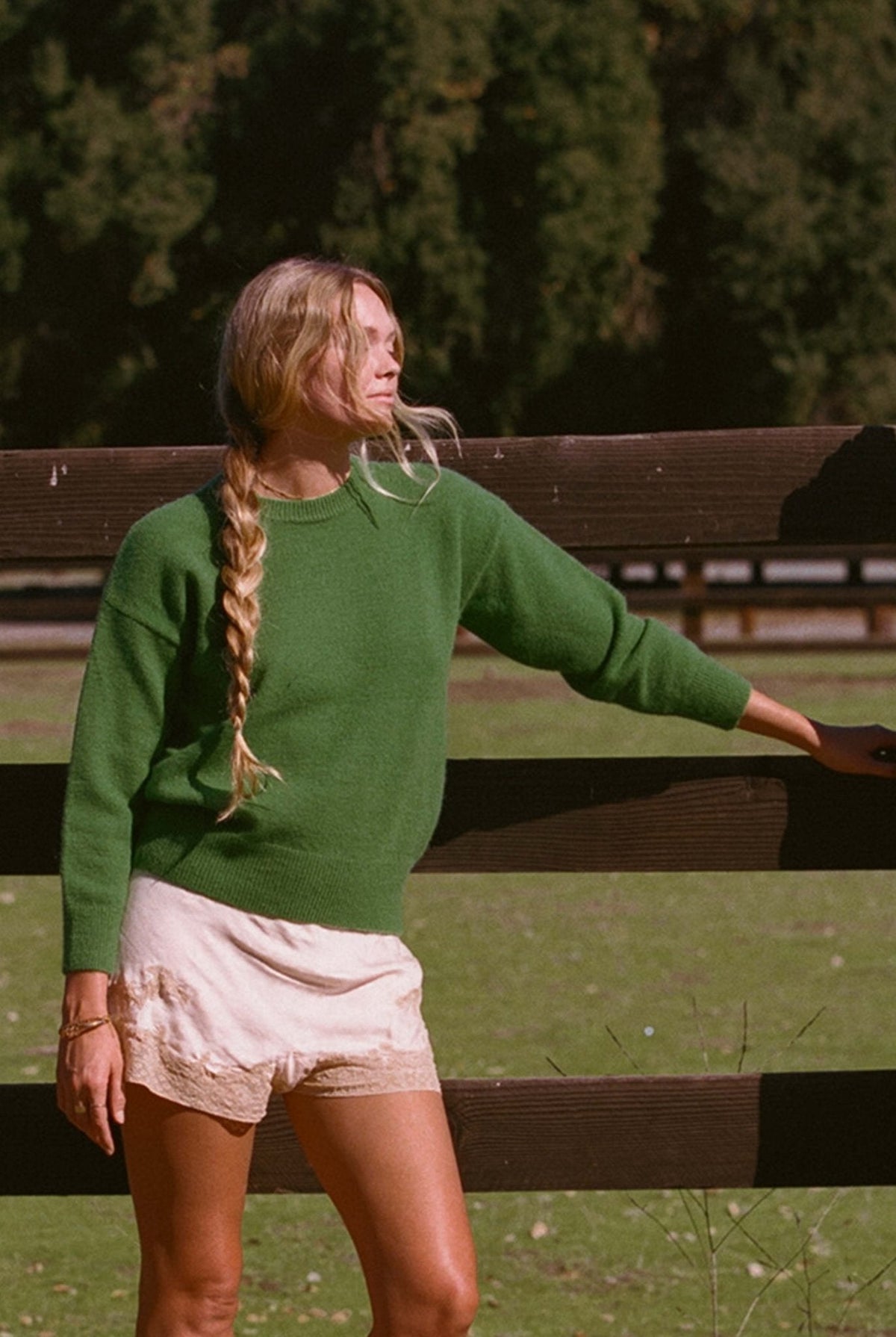 Hunter green knit sweater, crew neck with long sleeves and relaxed fit