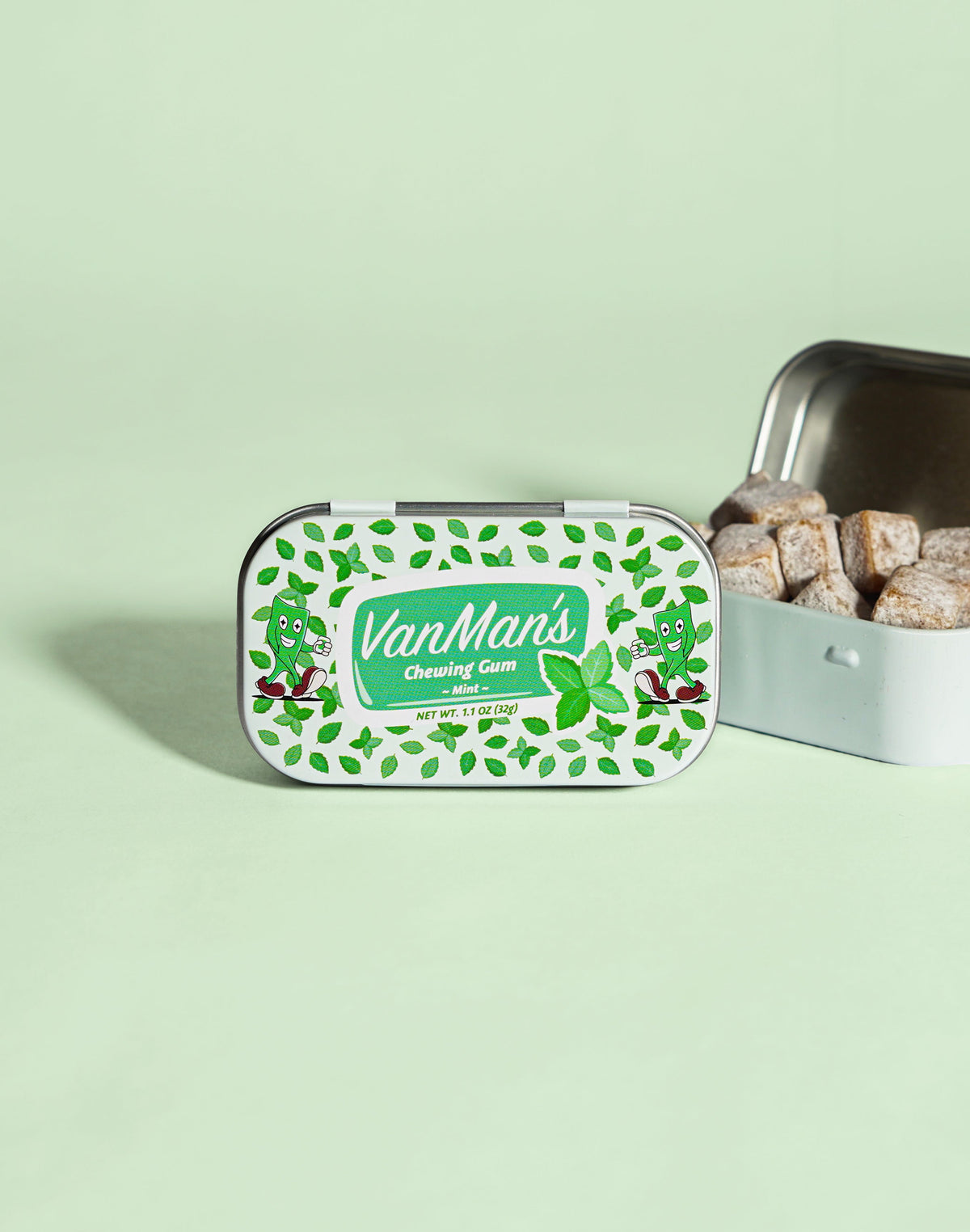 VanMan's mint remineralizing chewing gum tin with gum pieces visible