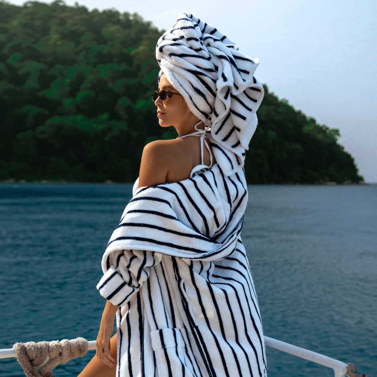 Black-and-white striped hooded bathrobe with tie belt and long sleeves