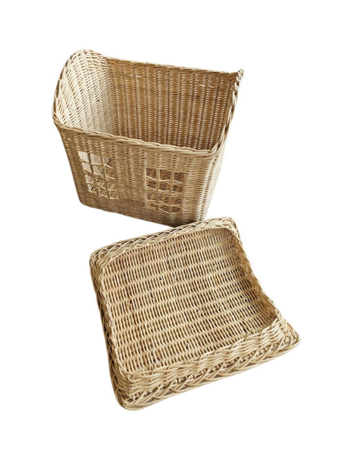 Open beige rattan toy storage basket with its lid removed