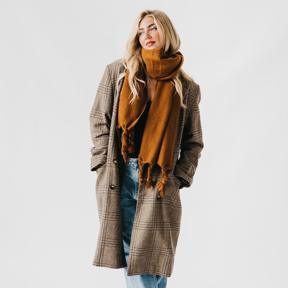 Twisted tassel scarf in caramel brown, fringed ends with twisted tassels