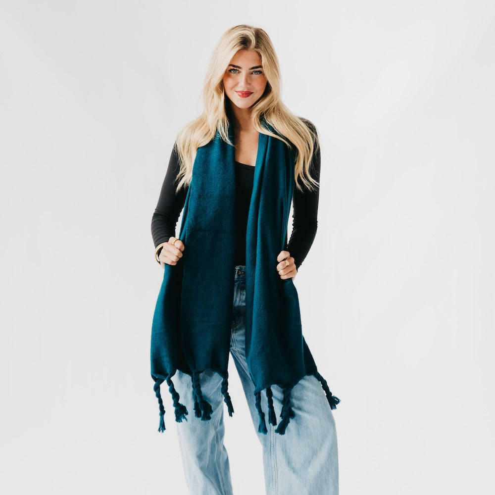 Twisted tassel scarf in teal, fringed ends with twisted tassel details