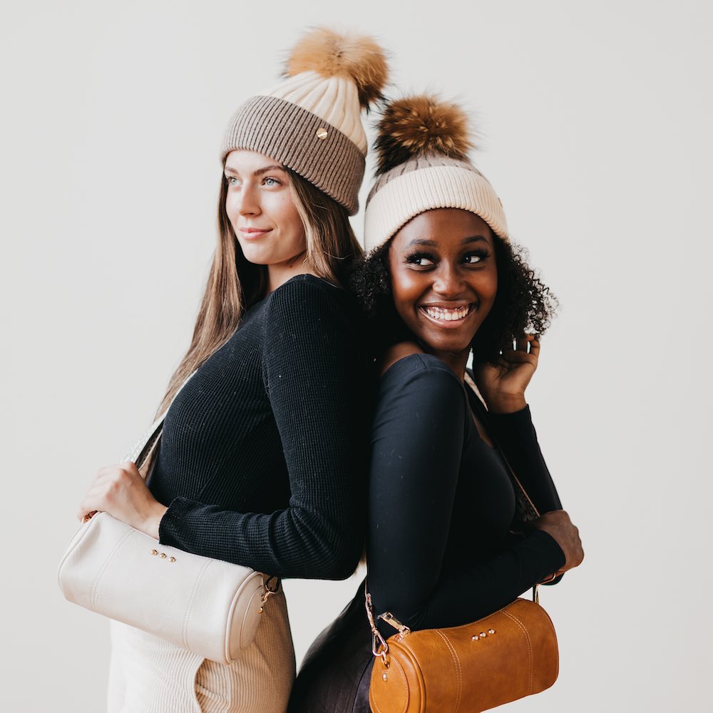 Two-tone angora knit beanie set with tan fur pom; light gray and cream bodies