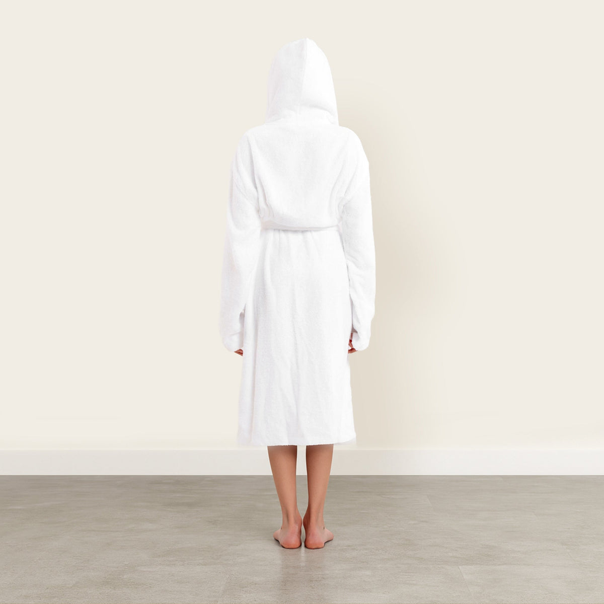 White unisex cotton bathrobe back view, hood up and mid-calf length