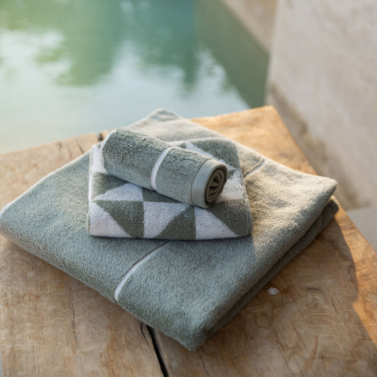 Cotton towels, light blue terry with white geometric diamond pattern