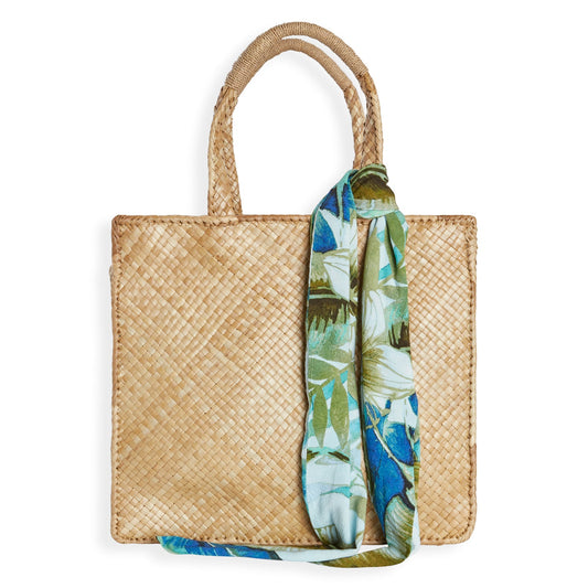 Tropical floral headwrap in blue and green with leafy botanical print on light fabric