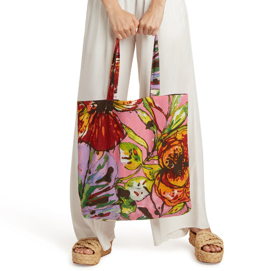 Floral farmers market tote bag with pink, orange, green artwork and short handles