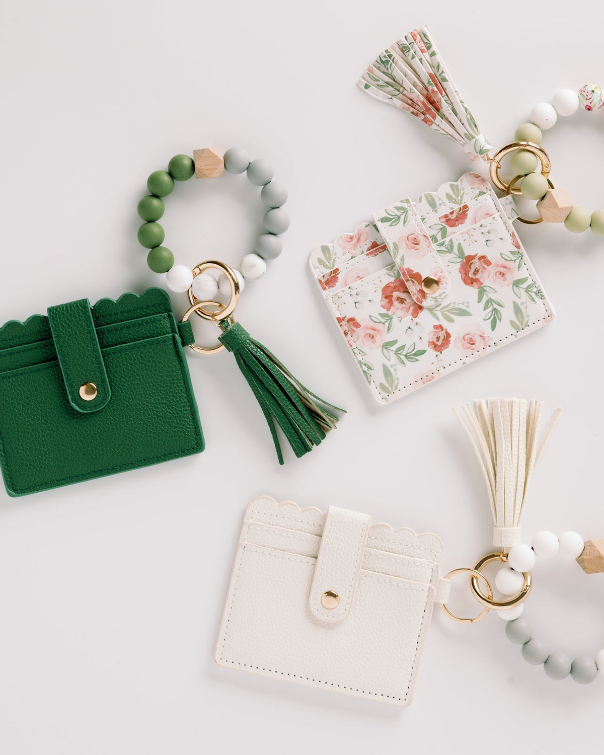 Dark green and floral wallet wristlet keychains with tassels and beaded keyrings